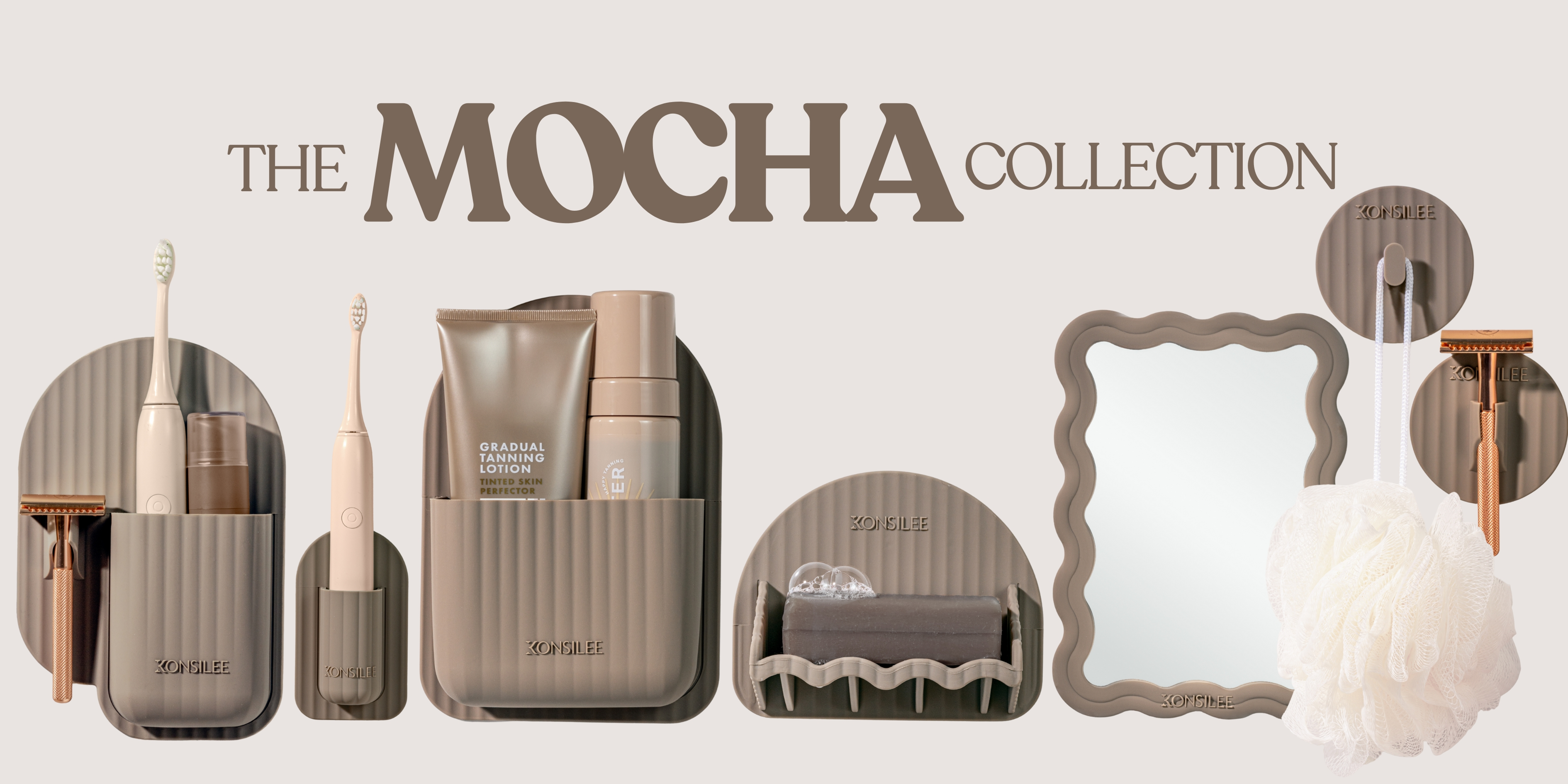 Promotional banner for the Konsilee Mocha Collection. Chocolate-brown bathroom accessories with fluted detailing and embossed logos are displayed on a neutral background. Featured items include an arch-shaped shower caddy, toothbrush holder, soap holder and electric toothbrush holder, along with a wavy-framed mirror and circled-shaped razor holder and hook. All items are styled with various accessories. 
